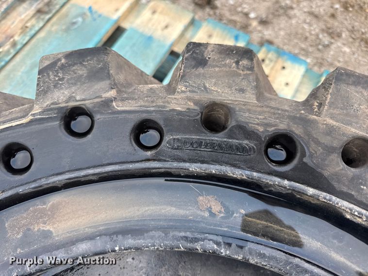 image for item EN0858 (2) Dobermann 33X12-20 skid steer tires and wheels