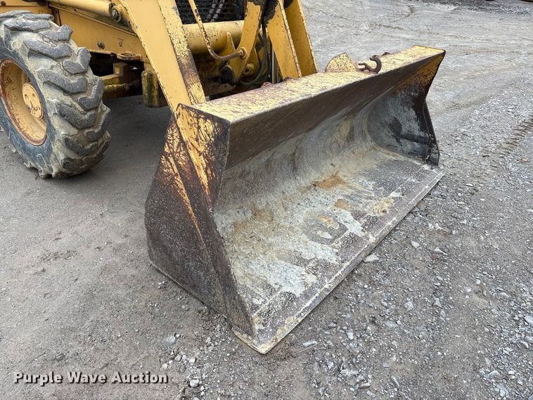 image for item FK1060 2000 John Deere 310SE backhoe