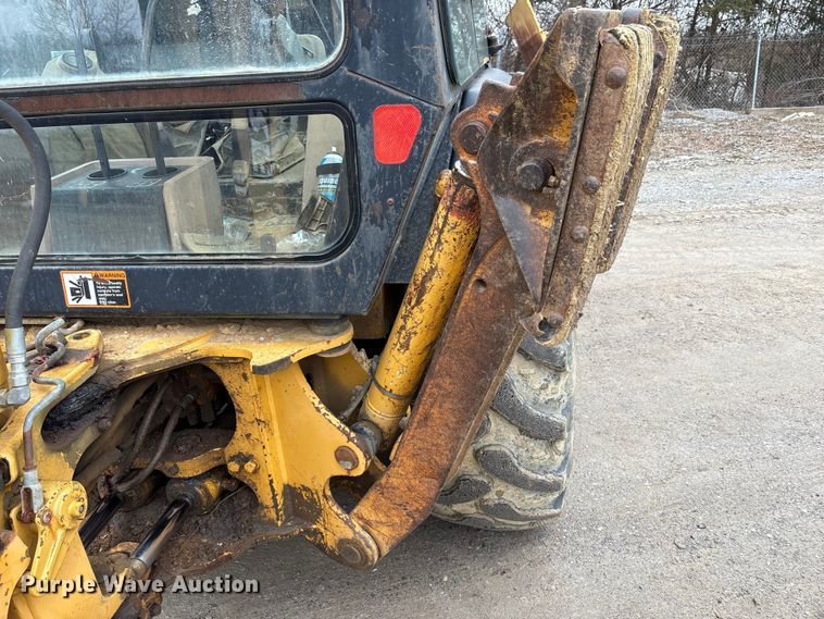 image for item FK1060 2000 John Deere 310SE backhoe