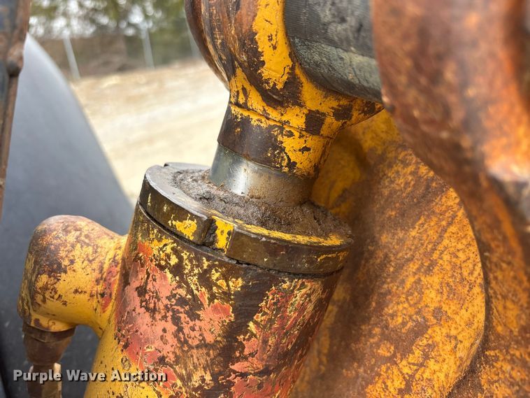 image for item FK1060 2000 John Deere 310SE backhoe