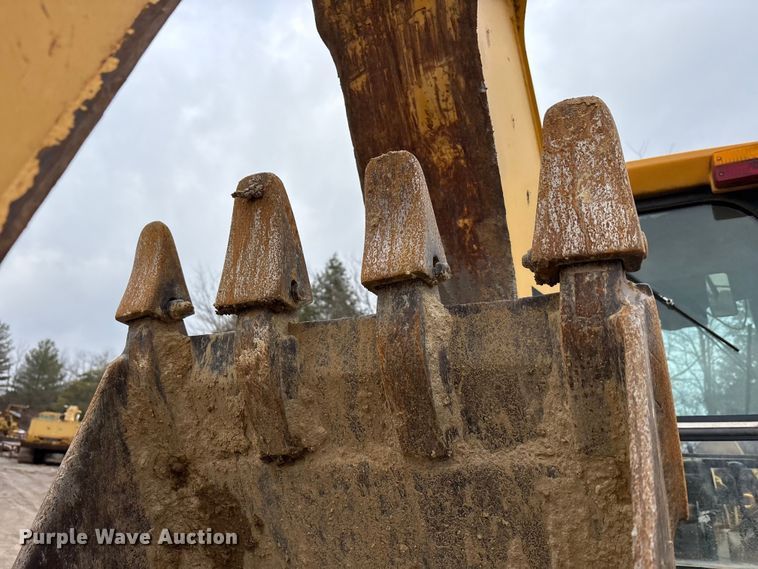 image for item FK1060 2000 John Deere 310SE backhoe