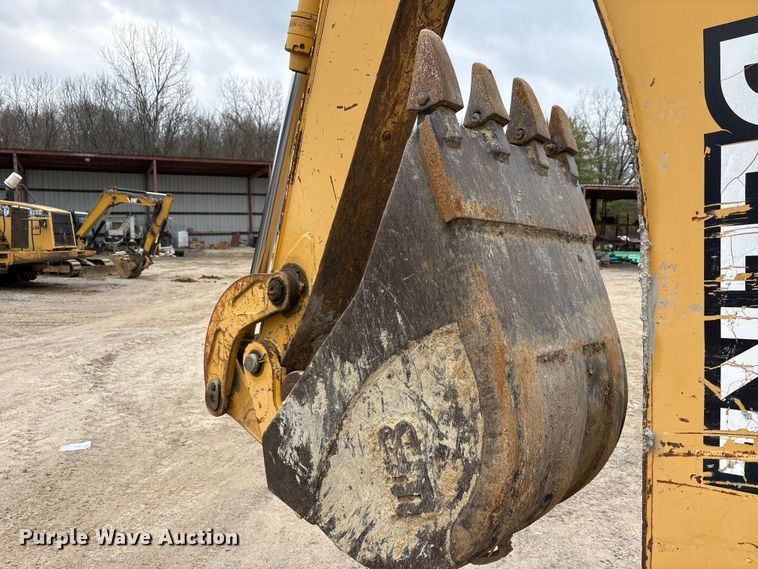 image for item FK1060 2000 John Deere 310SE backhoe