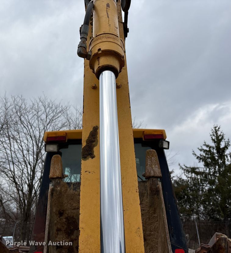 image for item FK1060 2000 John Deere 310SE backhoe