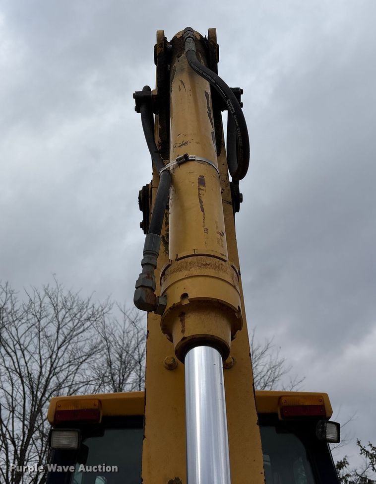 image for item FK1060 2000 John Deere 310SE backhoe