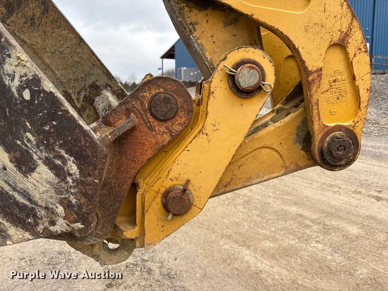 image for item FK1060 2000 John Deere 310SE backhoe