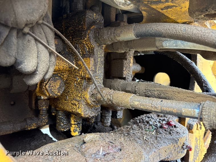 image for item FK1060 2000 John Deere 310SE backhoe