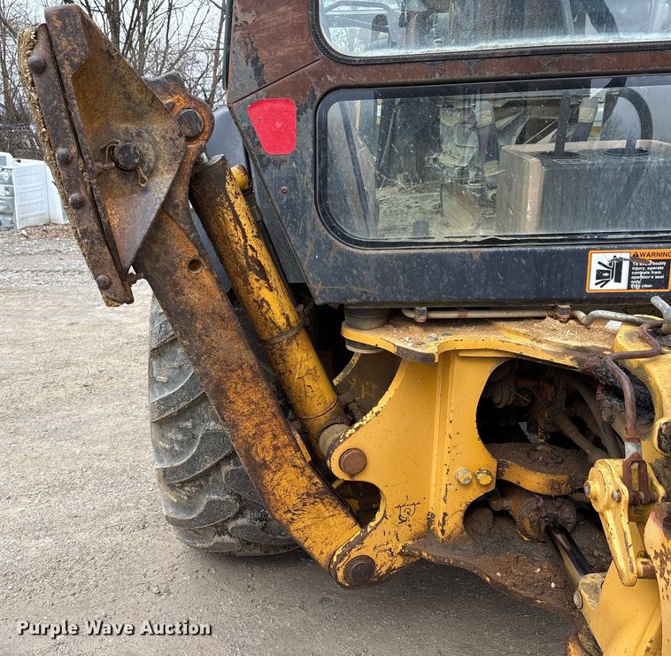 image for item FK1060 2000 John Deere 310SE backhoe