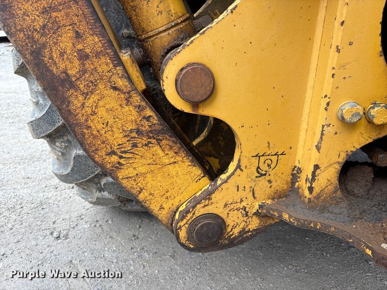 image for item FK1060 2000 John Deere 310SE backhoe