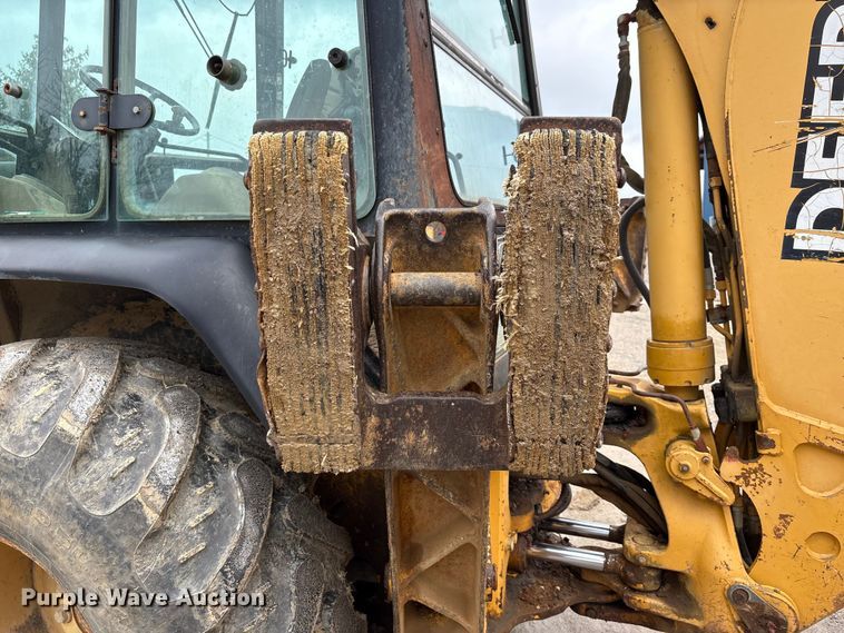 image for item FK1060 2000 John Deere 310SE backhoe