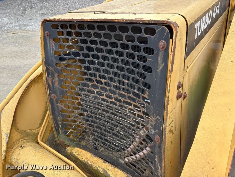 image for item FK1060 2000 John Deere 310SE backhoe