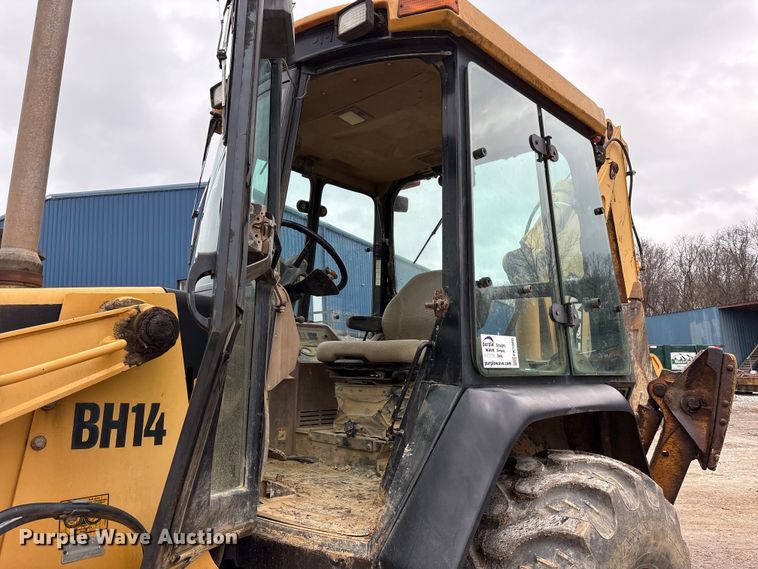 image for item FK1060 2000 John Deere 310SE backhoe