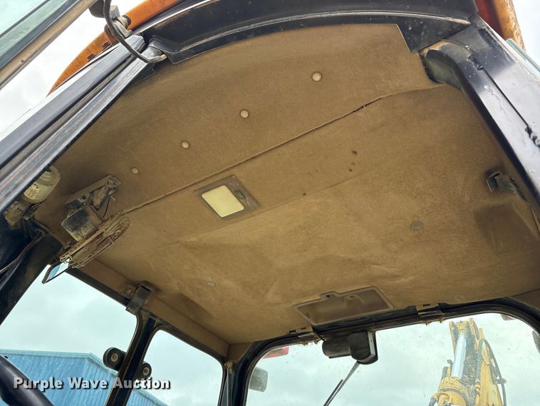 image for item FK1060 2000 John Deere 310SE backhoe