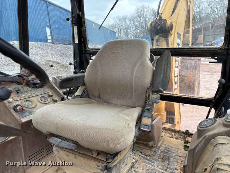 image for item FK1060 2000 John Deere 310SE backhoe