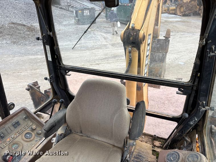 image for item FK1060 2000 John Deere 310SE backhoe