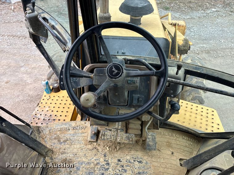 image for item FK1060 2000 John Deere 310SE backhoe