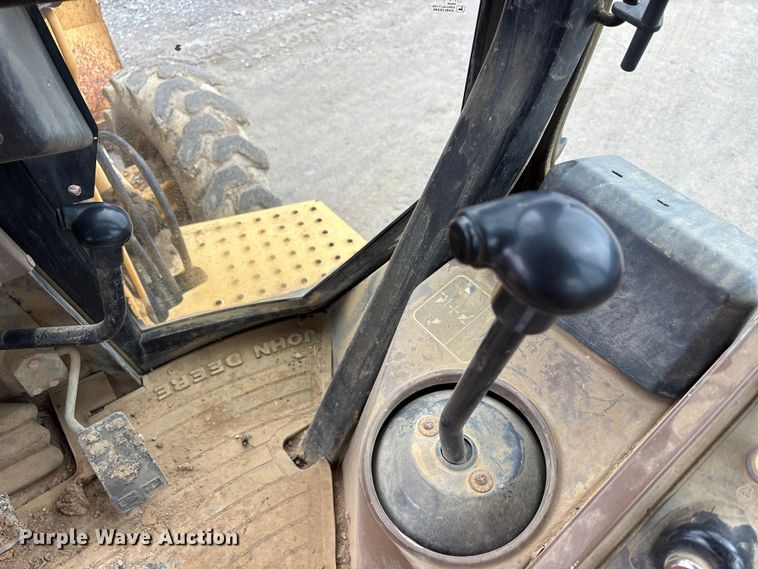 image for item FK1060 2000 John Deere 310SE backhoe