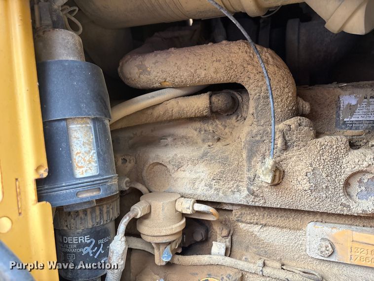 image for item FK1060 2000 John Deere 310SE backhoe