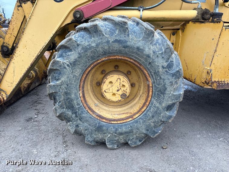 image for item FK1060 2000 John Deere 310SE backhoe