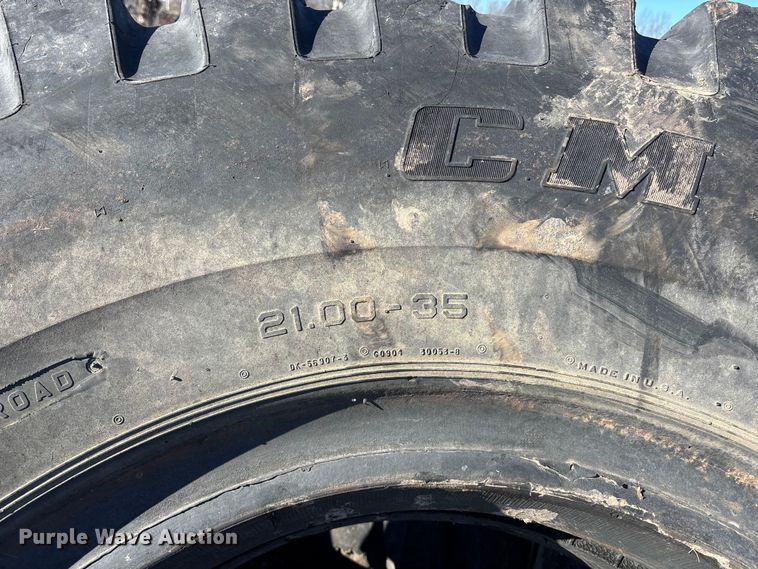 image for item OE9291 (7) 21.00-35 tires
