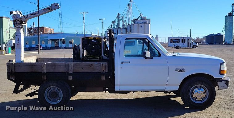 image for item DT0821 1997 Ford F250 flatbed pickup truck