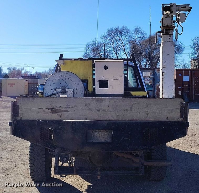 image for item DT0821 1997 Ford F250 flatbed pickup truck