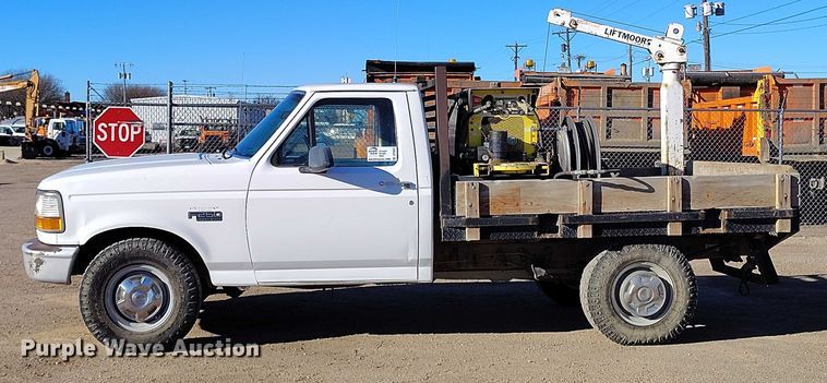 image for item DT0821 1997 Ford F250 flatbed pickup truck
