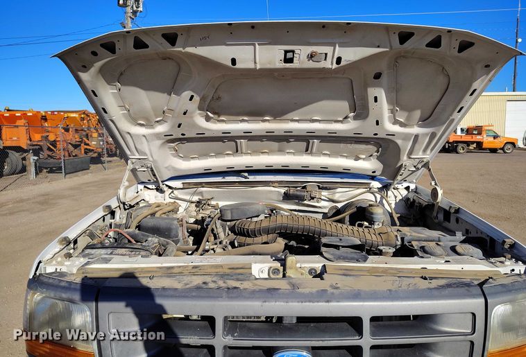 image for item DT0821 1997 Ford F250 flatbed pickup truck