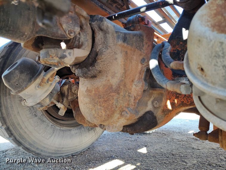 image for item DT0822 1995 Peterbilt 320 roll-off container truck