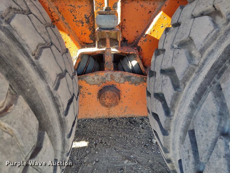 image for item DT0822 1995 Peterbilt 320 roll-off container truck