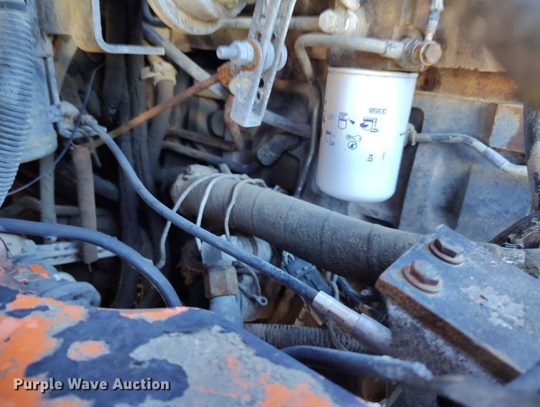 image for item DT0822 1995 Peterbilt 320 roll-off container truck