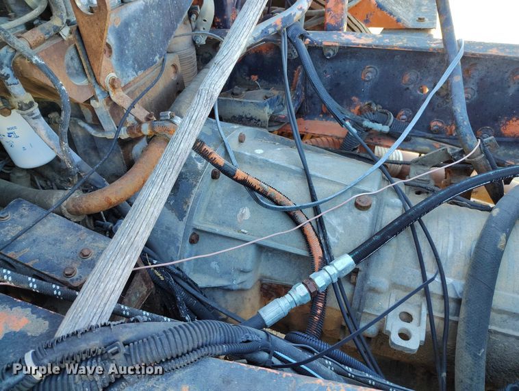 image for item DT0822 1995 Peterbilt 320 roll-off container truck