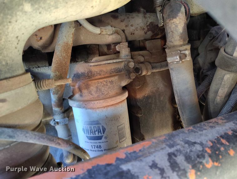 image for item DT0822 1995 Peterbilt 320 roll-off container truck