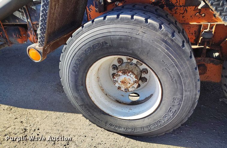 image for item DT0822 1995 Peterbilt 320 roll-off container truck