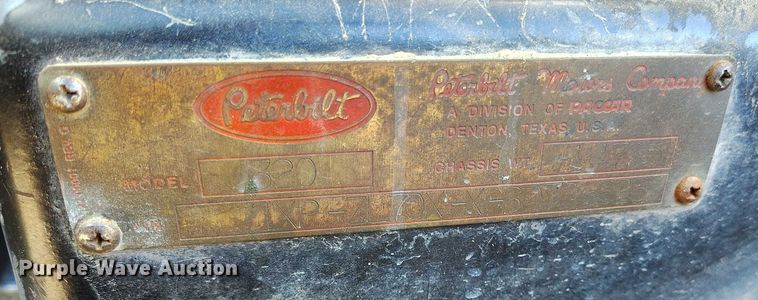 image for item DT0822 1995 Peterbilt 320 roll-off container truck