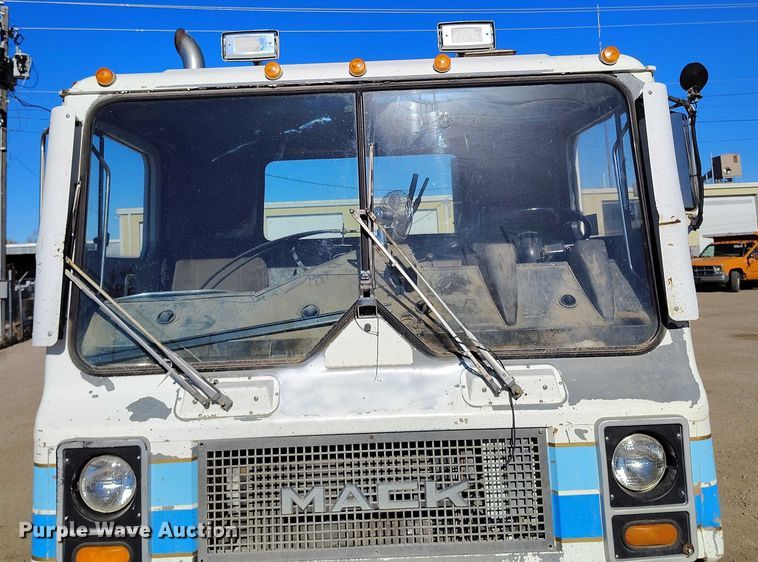 image for item DT0823 1987 Mack MR688S roll-off container truck