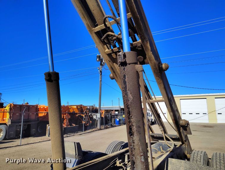 image for item DT0823 1987 Mack MR688S roll-off container truck