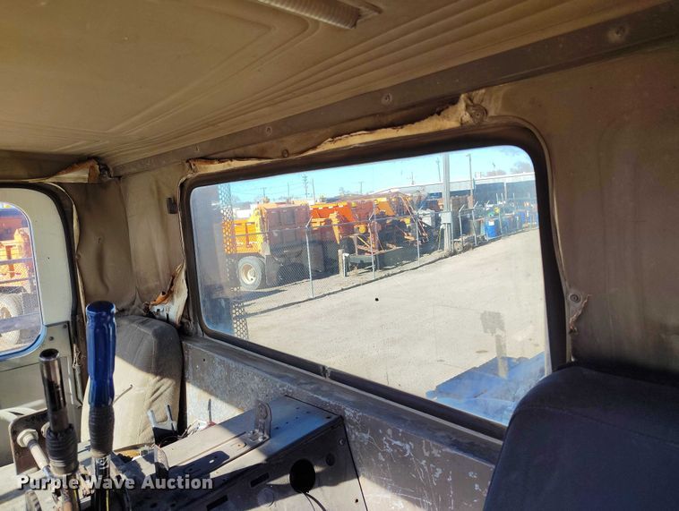 image for item DT0823 1987 Mack MR688S roll-off container truck