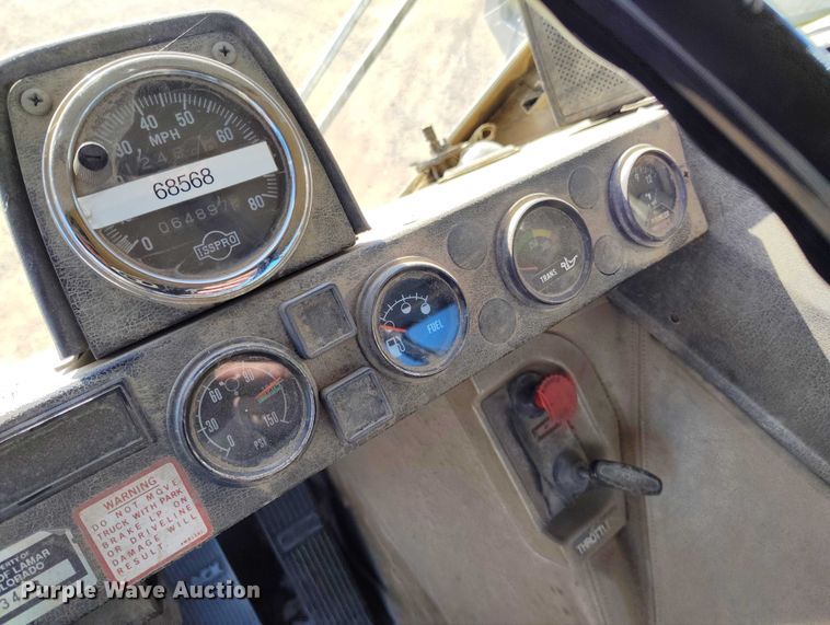 image for item DT0823 1987 Mack MR688S roll-off container truck