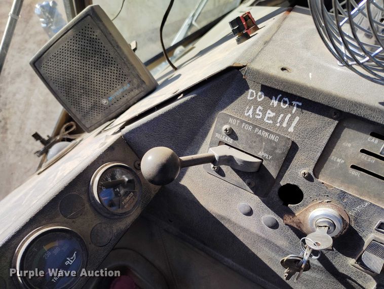 image for item DT0823 1987 Mack MR688S roll-off container truck