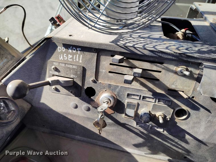 image for item DT0823 1987 Mack MR688S roll-off container truck