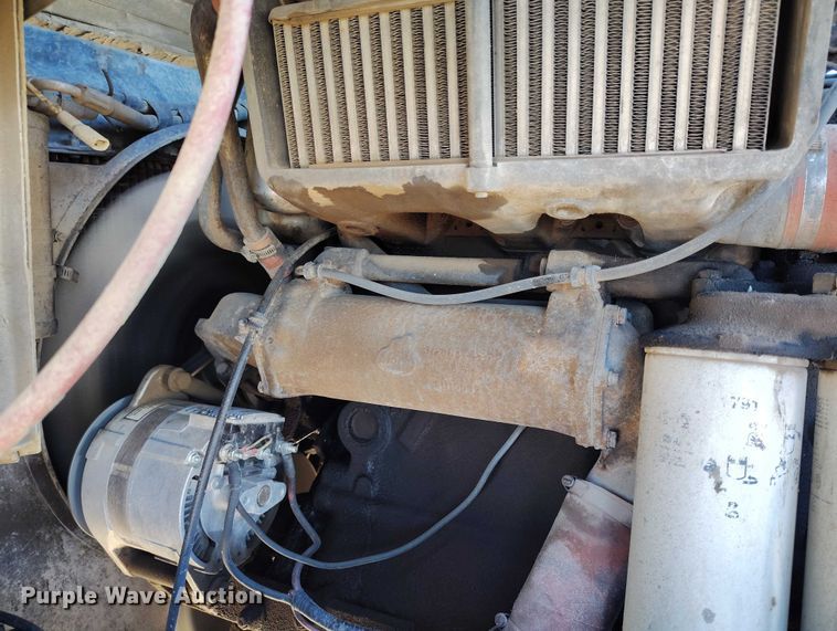 image for item DT0823 1987 Mack MR688S roll-off container truck