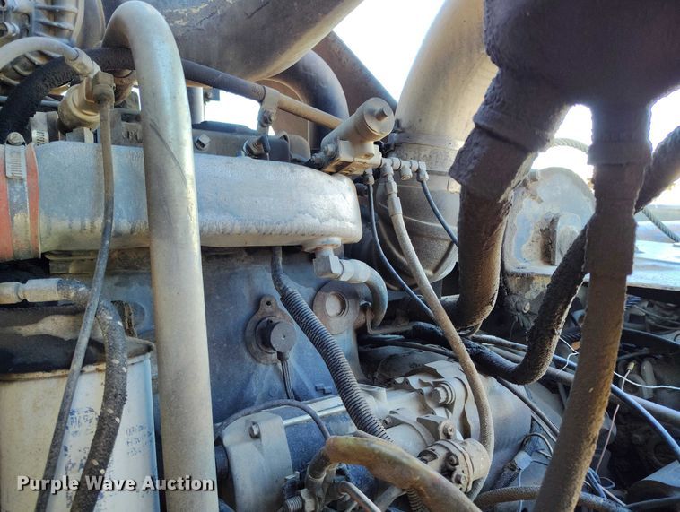 image for item DT0823 1987 Mack MR688S roll-off container truck