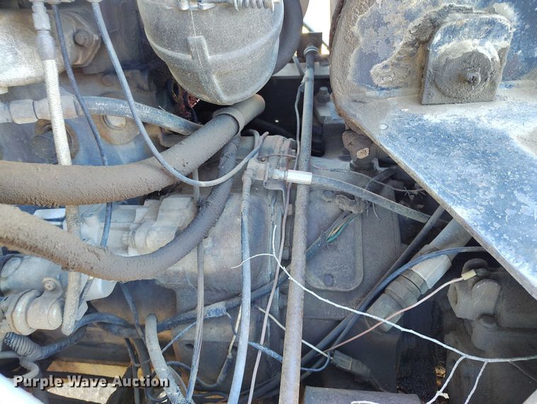 image for item DT0823 1987 Mack MR688S roll-off container truck