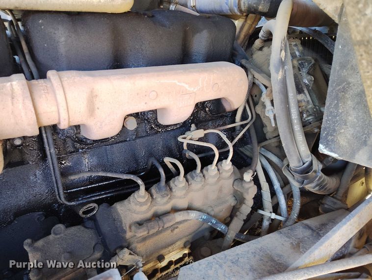 image for item DT0823 1987 Mack MR688S roll-off container truck