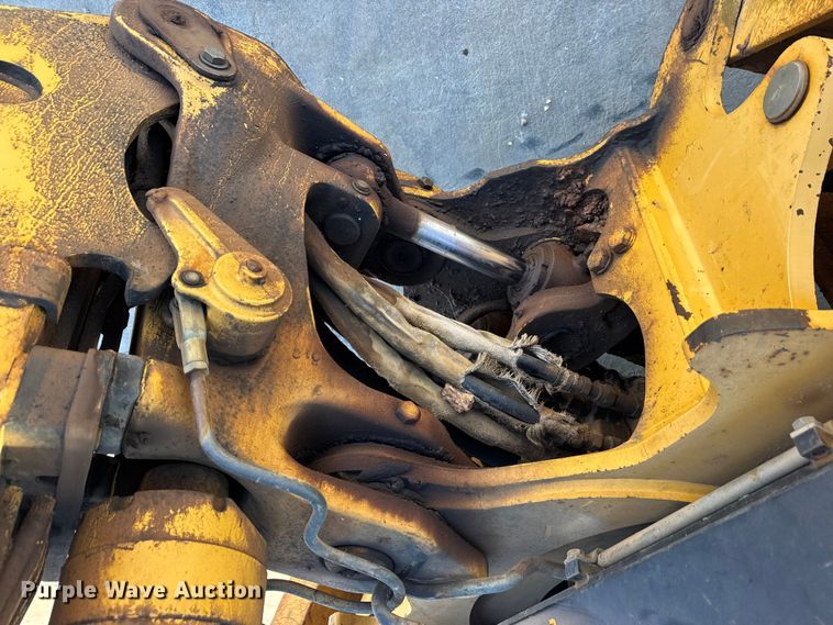 image for item EN0884 1999 John Deere 310SE backhoe