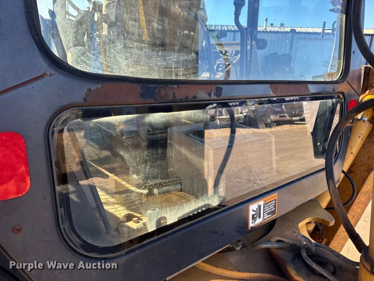 image for item EN0884 1999 John Deere 310SE backhoe