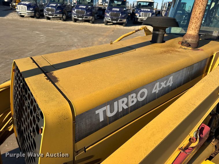 image for item EN0884 1999 John Deere 310SE backhoe