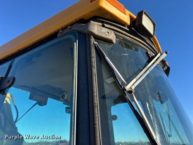 image for item EN0884 1999 John Deere 310SE backhoe