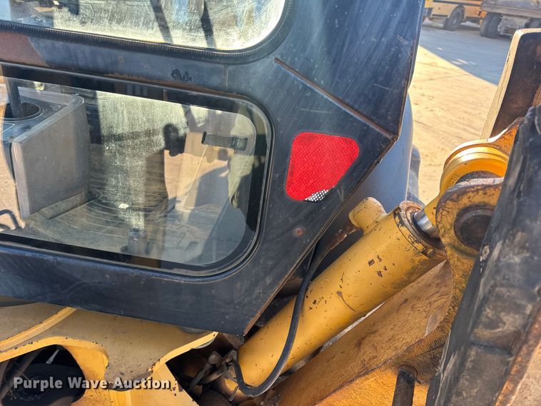 image for item EN0884 1999 John Deere 310SE backhoe