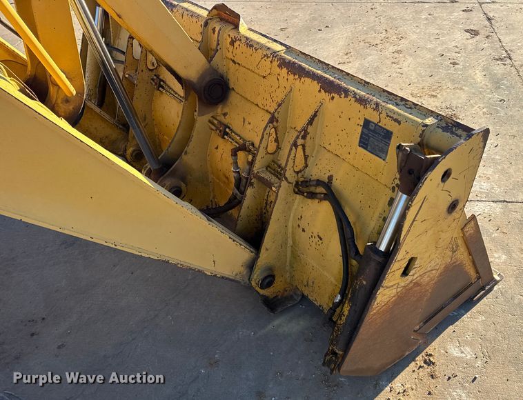 image for item EN0884 1999 John Deere 310SE backhoe
